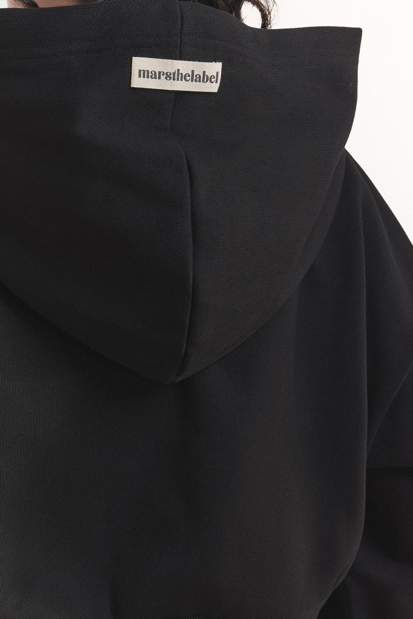 The Basic Crop Zip Hoodie in Black - Image 8