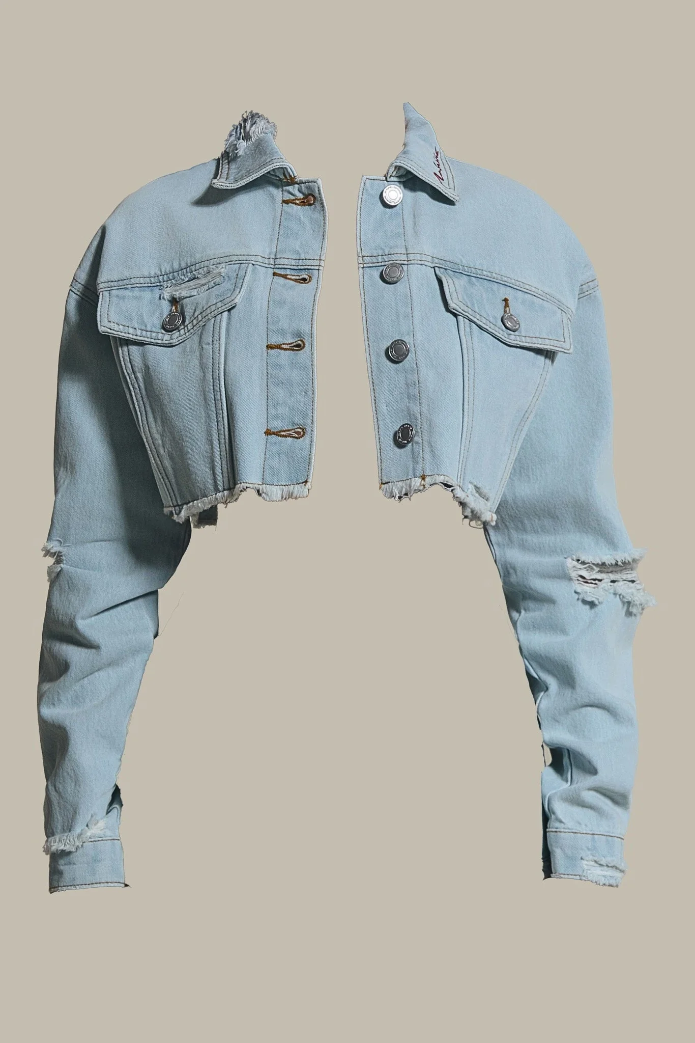 The Esha Cropped Denim Jacket in Light Wash Blue - Image 6