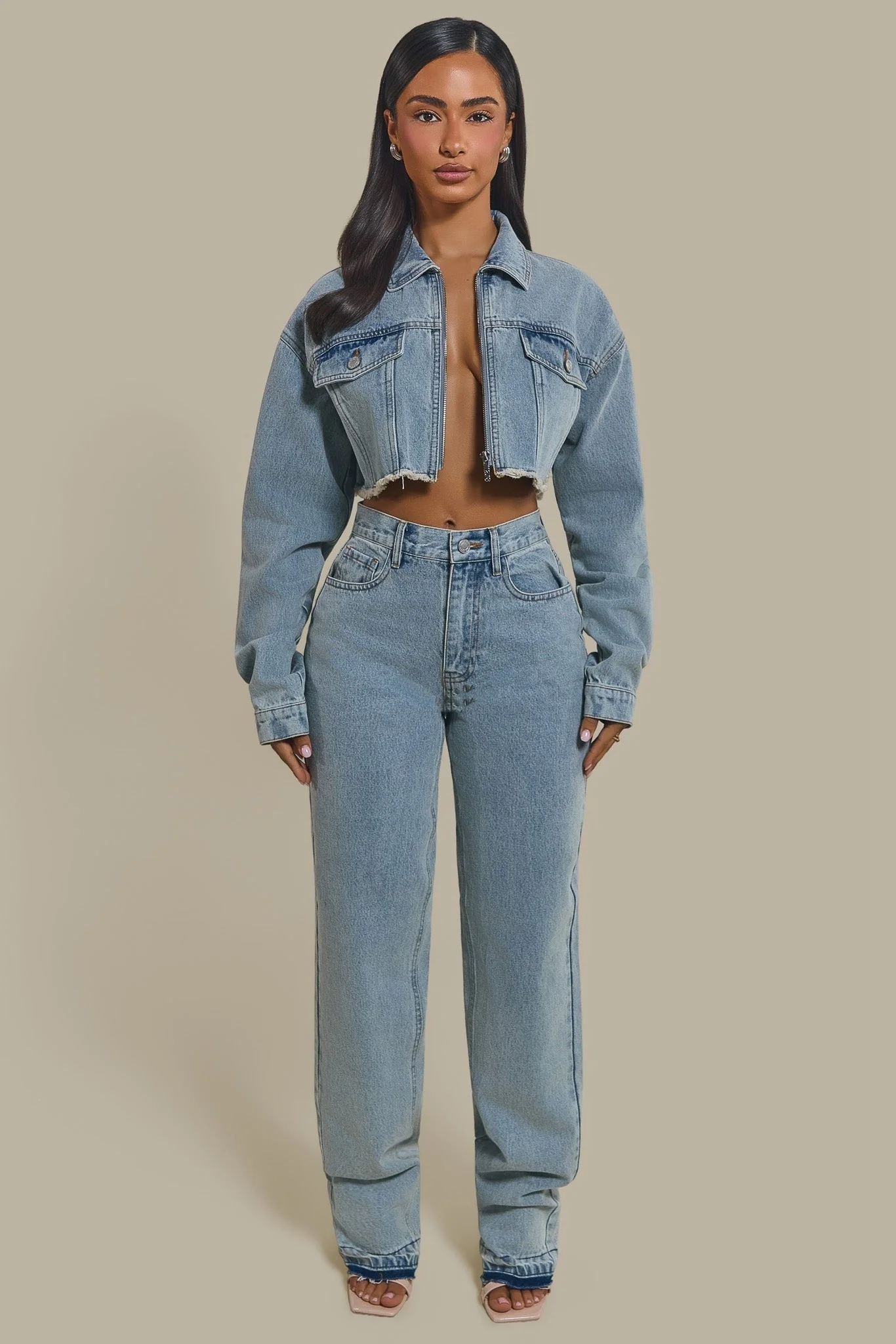 The Kali Mid-Rise Jeans in Light Wash Blue - Image 3
