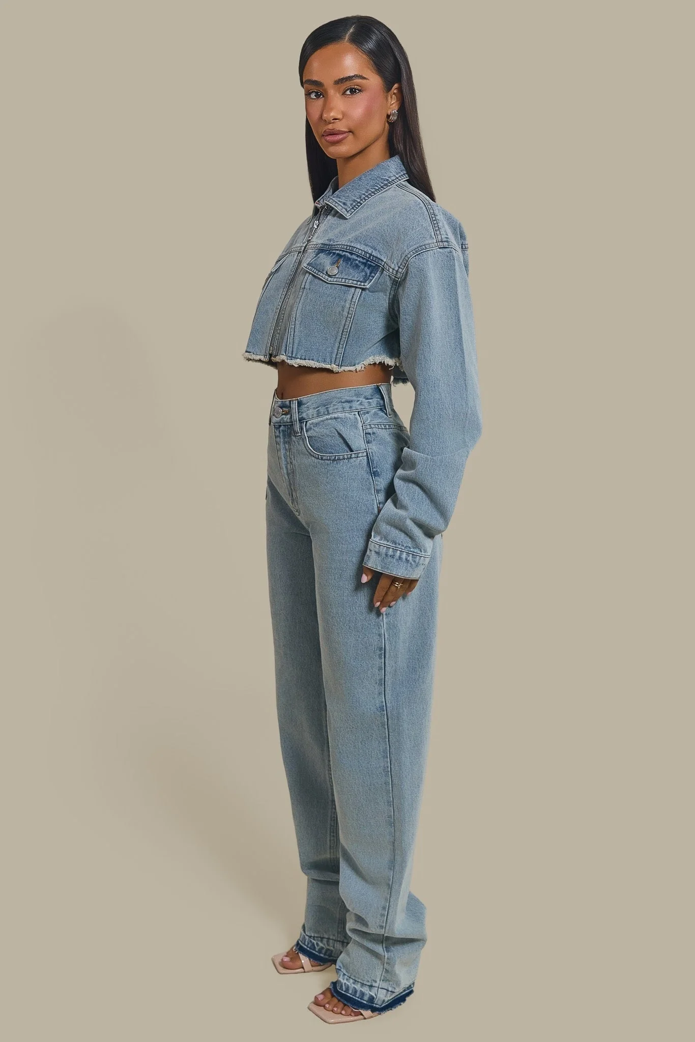 The Kali Mid-Rise Jeans in Light Wash Blue - Image 4