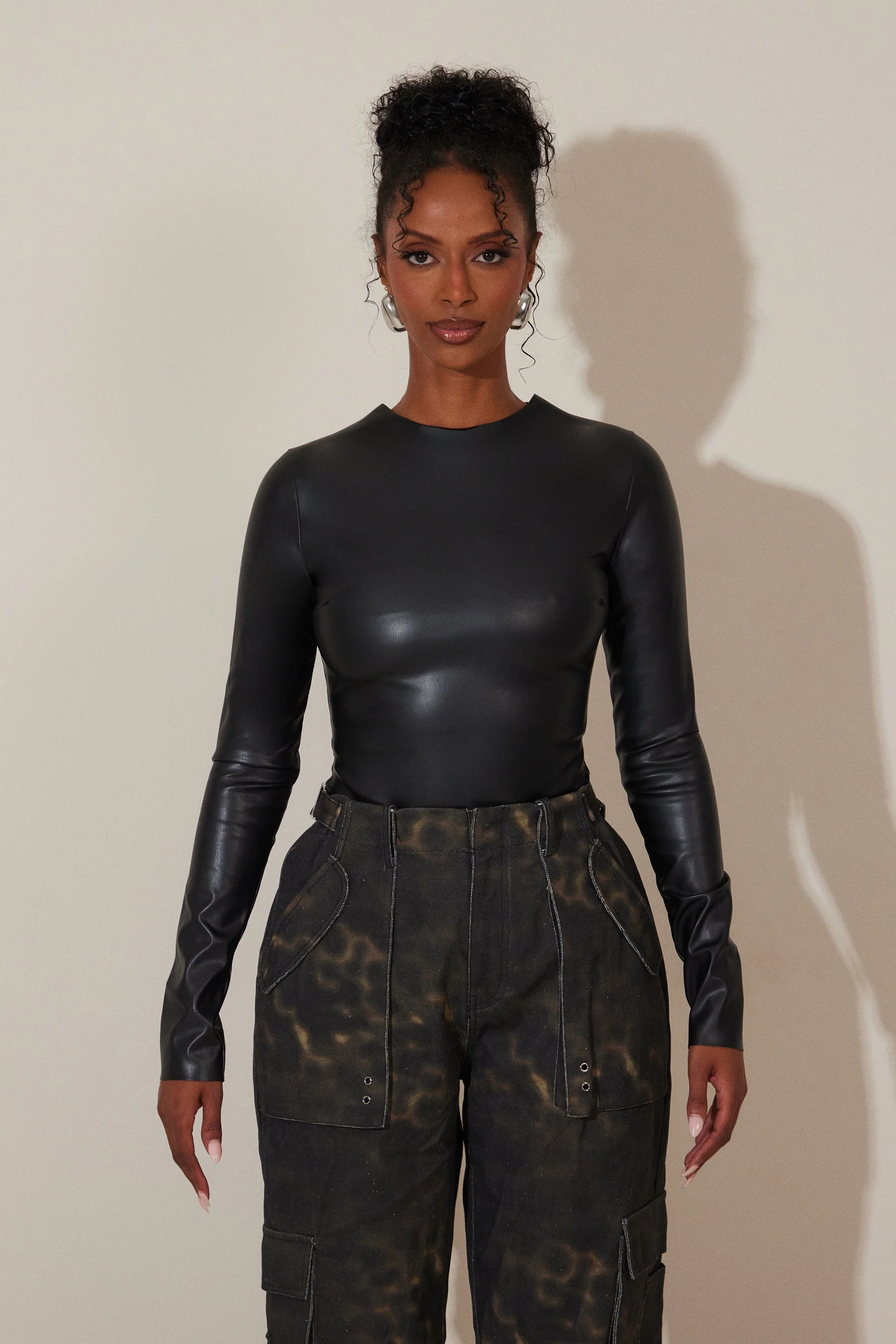 The Rumer Long Sleeved Bodysuit in Black